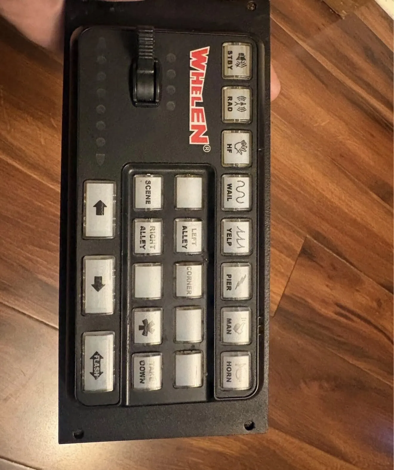 Front of the Whelen 21-button WeCan control head with its slide switch and labeled buttons.